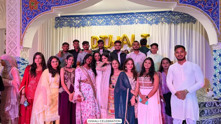 A group of students posing together at a Diwali celebration