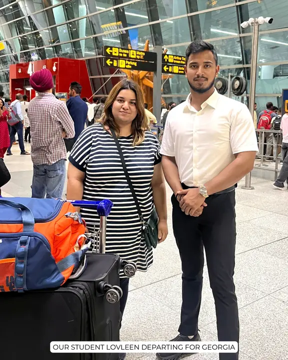 Lovleen with a Scholars Abroad representative and luggage at the airport