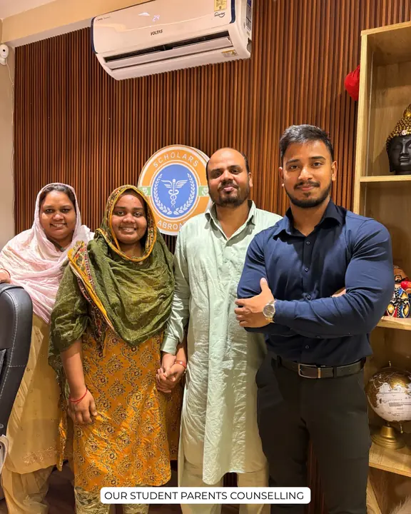 Family members with a Scholars Abroad representative in the counselling office