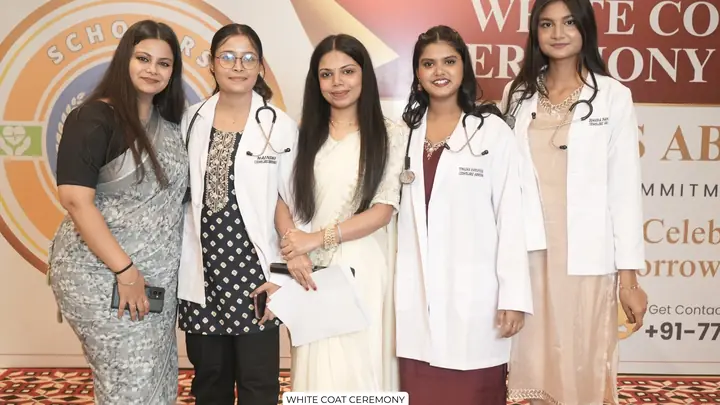 Students and Scholars Abroad representatives at a white coat ceremony